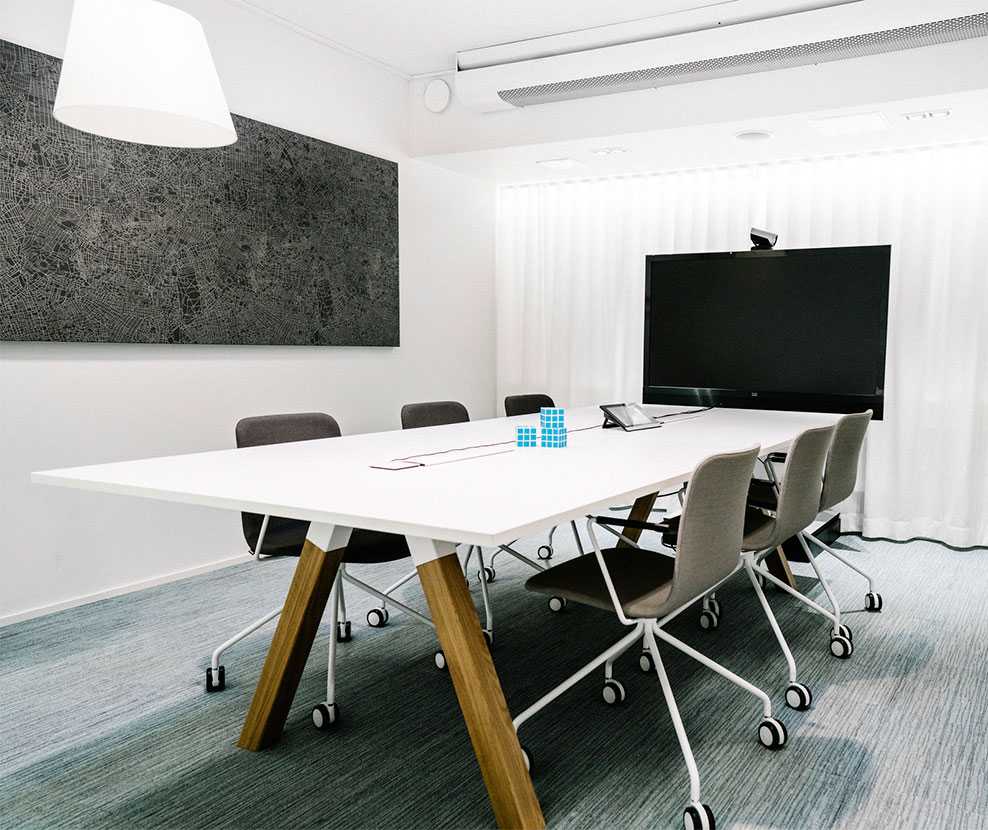 Martela's Frankie conference table and Sola chairs at UMA Esplanadi in Helsinki