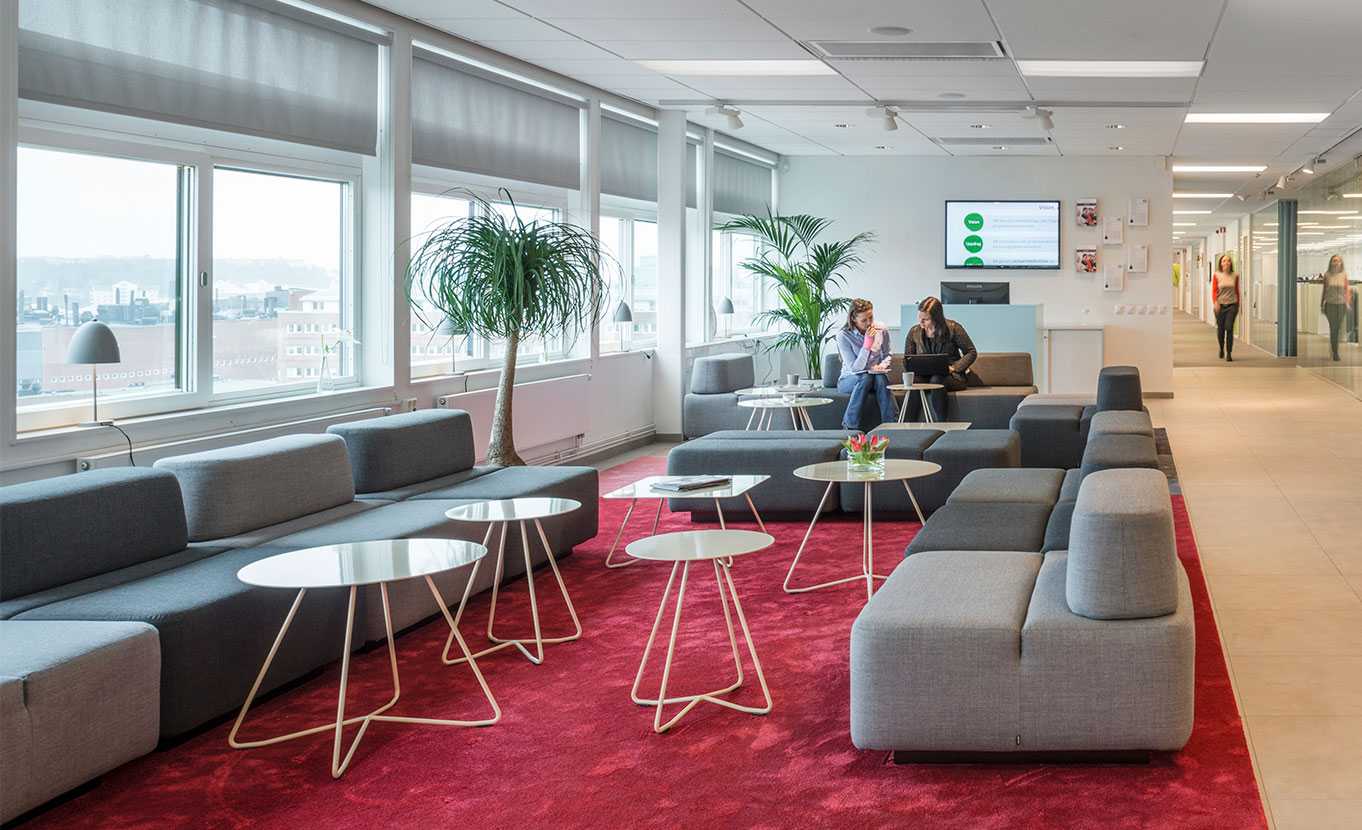 Martela's Movie sofas and Scoop tables at Vitec's office in Stockholm, Sweden