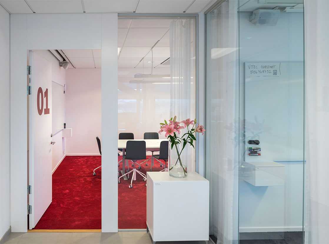 Martela's Sola chairs and Frankie table at Vitec's office in Stockholm, Sweden