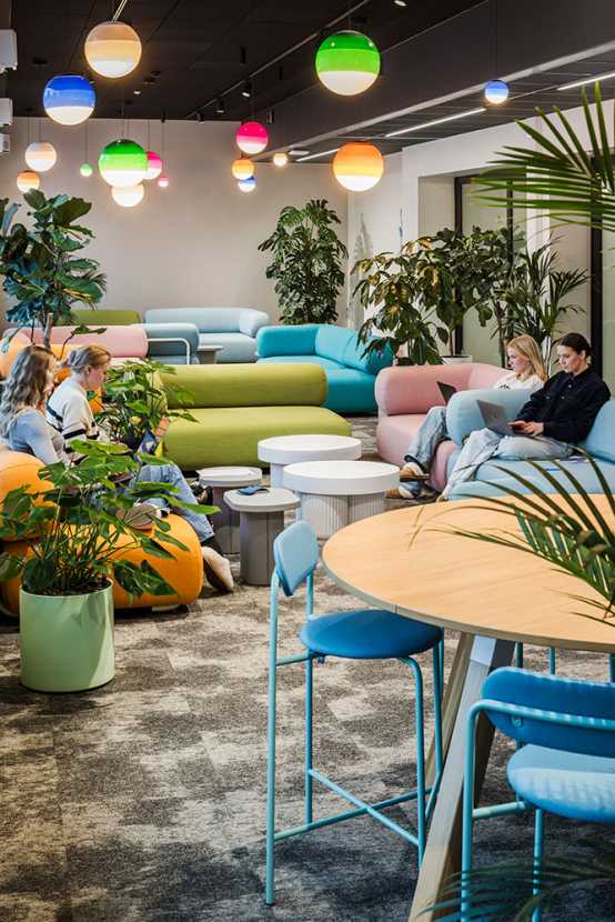 Lounge area with plush sofas in Wolt's office