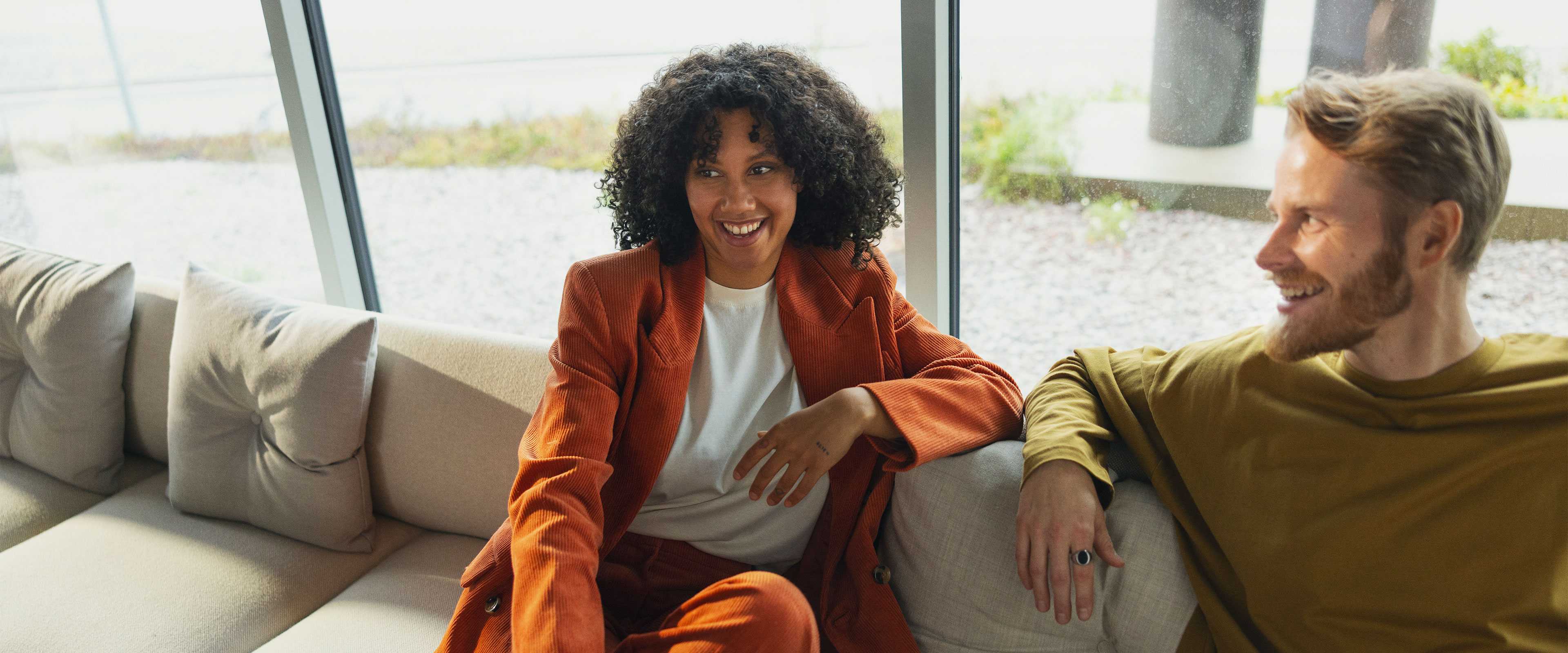 Two happy people on the couch