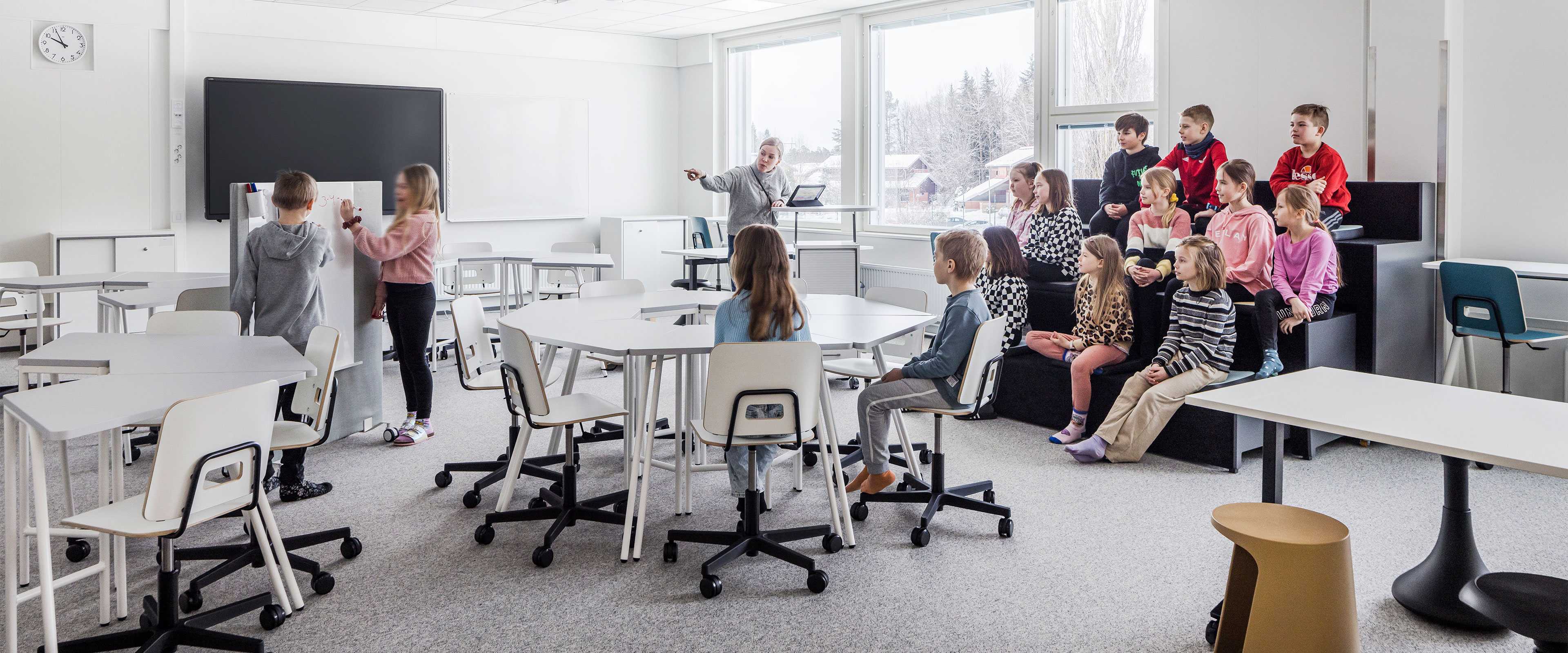 Pupils studying in the classroom