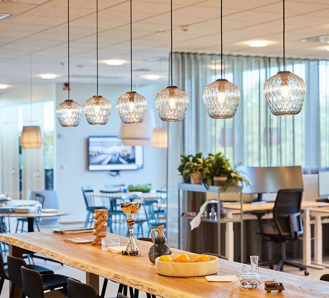 Lamps above a meeting area at NCC Uppsala's office